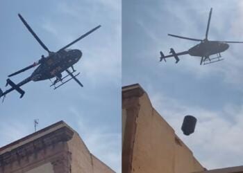 VIDEO: Helicóptero tira tinaco desde una azotea en pleno desfile