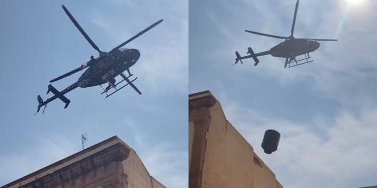VIDEO: Helicóptero tira tinaco desde una azotea en pleno desfile