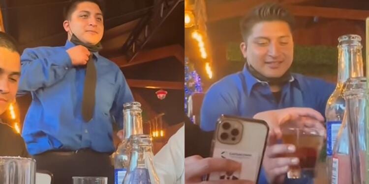 VIDEO: Mesero de un restaurante se pasa de copas y termina renunciando y sentado en la mesa con los clientes